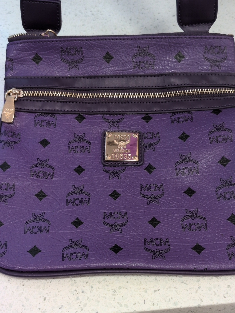 MCM Purple Monogram Crossbody with Gold Hardware